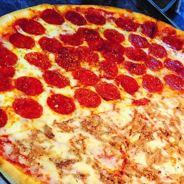 Close-up of a pepperoni and cheese pizza